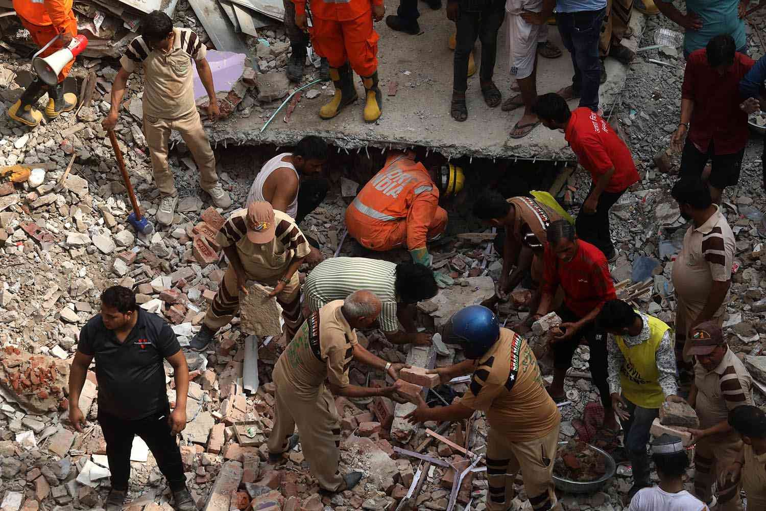 India teams search for survivors after Delhi building collapse kills six