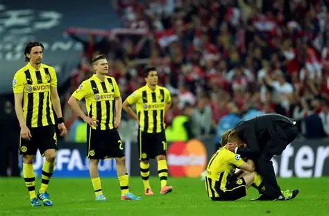 Dortmunds Karetsas hospitalised after collapsing in Champions League match
